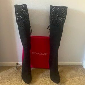 Thigh high black suede boots